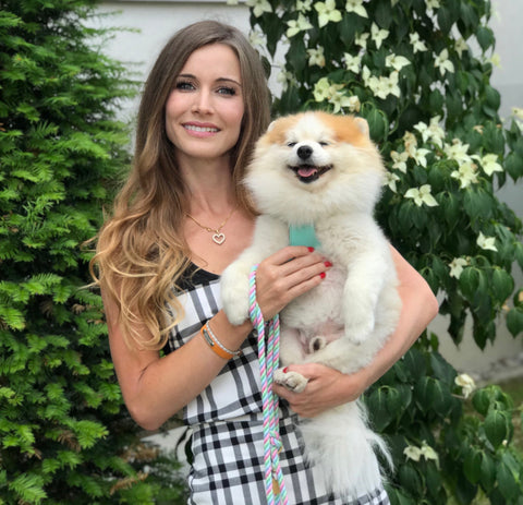 Jacqueline founder with pomeranian Baloo