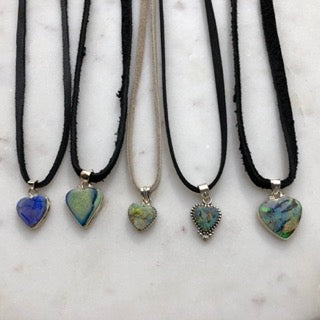 sterling silver heart pendants set in opal with leather tie or sliding bead closure