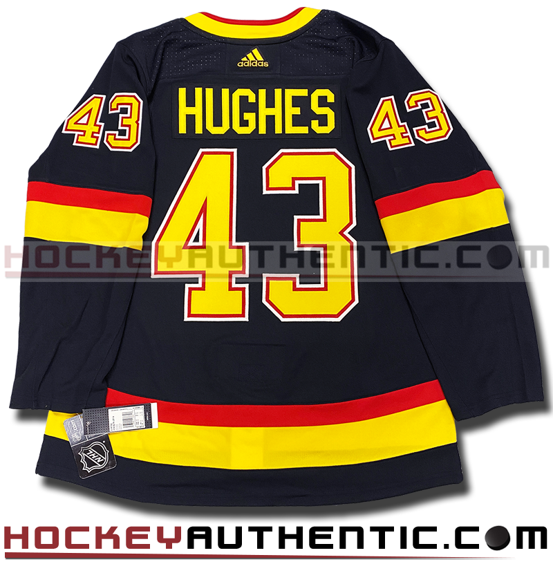 canucks black skate jersey