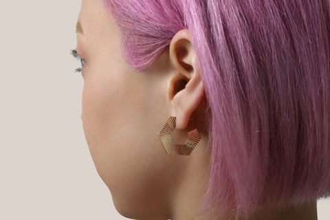 14k Yellow Gold Hexagon C Hoop Earrings as worn by model