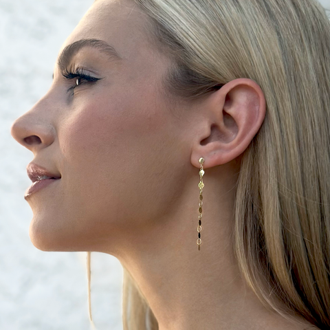 Mirror Drop Chain Earrings worn by a female model