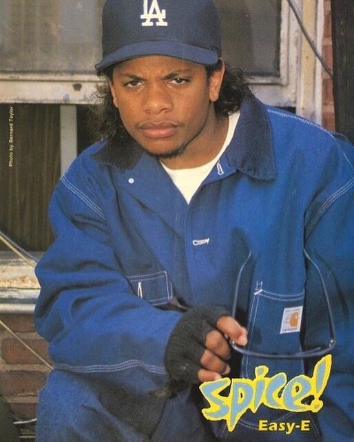 L.A. rap icon Eazy-E wearing a Carhartt Chalk Shirt.