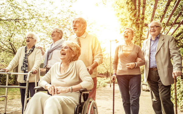 happy people using mobility aid equipment