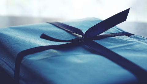 Blue gift with ribbon