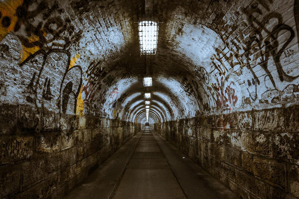 https://cdn.shopify.com/s/files/1/0247/1378/9525/files/A_graffiti_underground_tunnel_600x600.jpg?v=1655238823