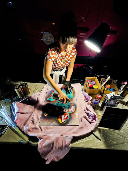 A photo of a lady hand printing