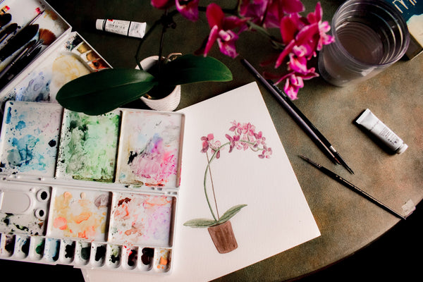 A photo of white pink and floral painting