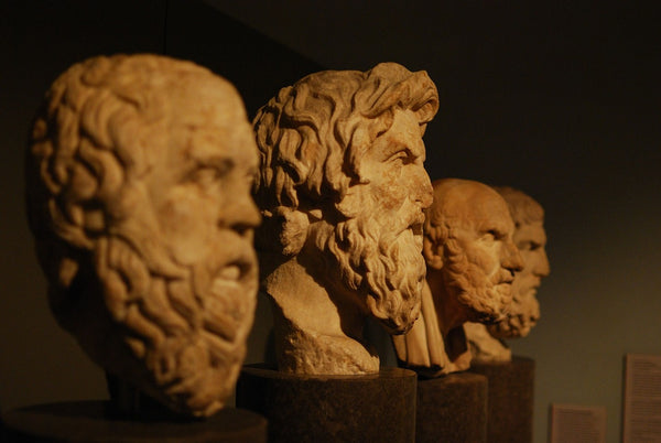 A sculpture carving of great philosophers