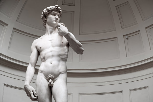 A sculpture of a naked man