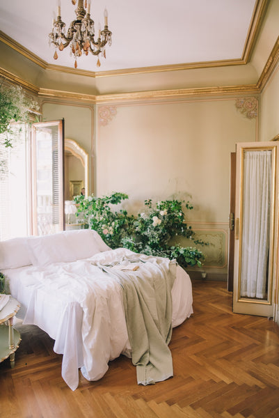 A white bed in the bedroom