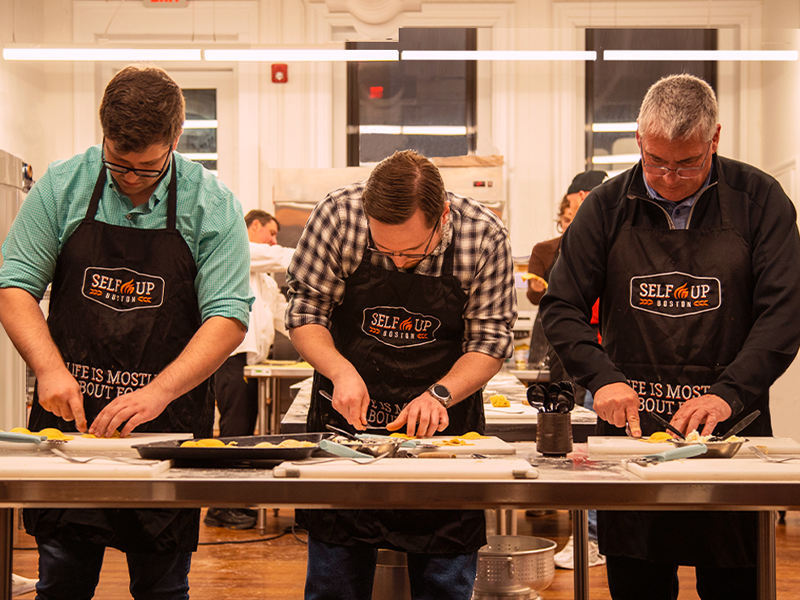 Team Building Activties | 3 people cooking ravioli