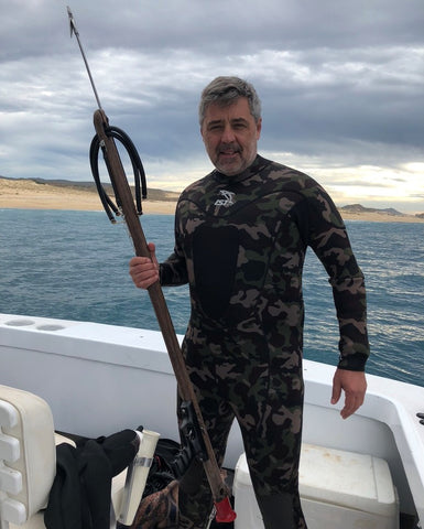 Mike in Wetsuit with spear