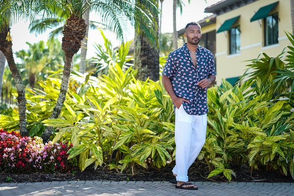 man walks in beautiful tropical resort