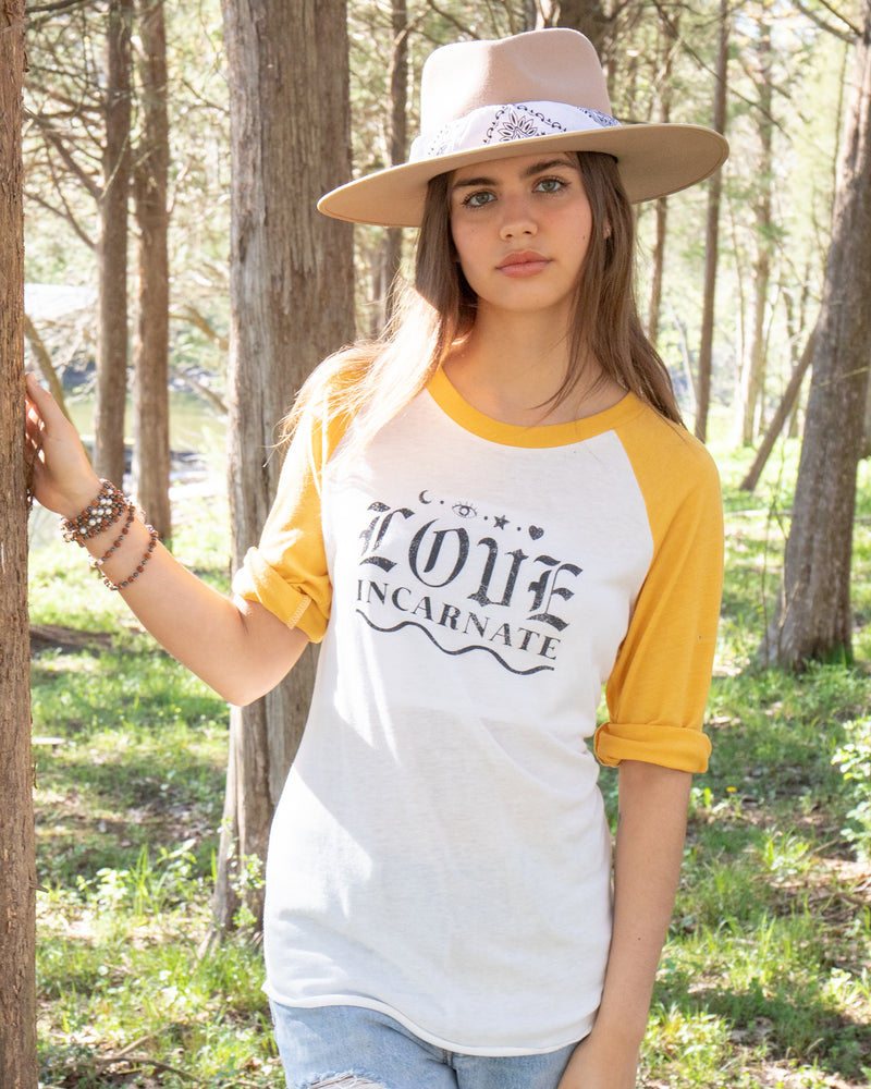 yellow and white baseball tee