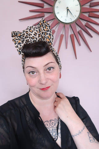 Woman in leopard vintage turban