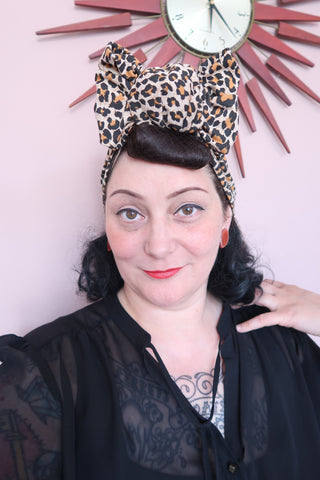 Woman with vintage hair and leopard turban