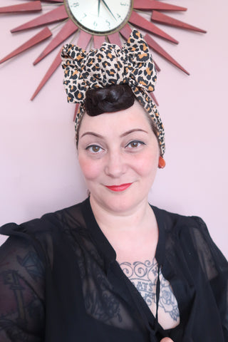 Woman in leopard hair turban