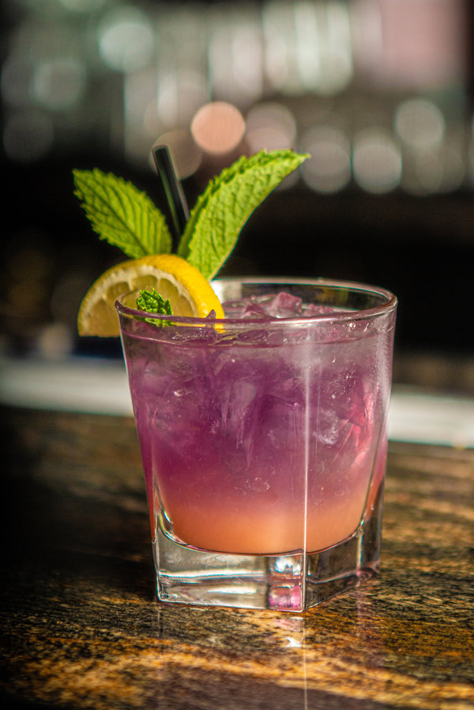 Purple mocktail with lemmon