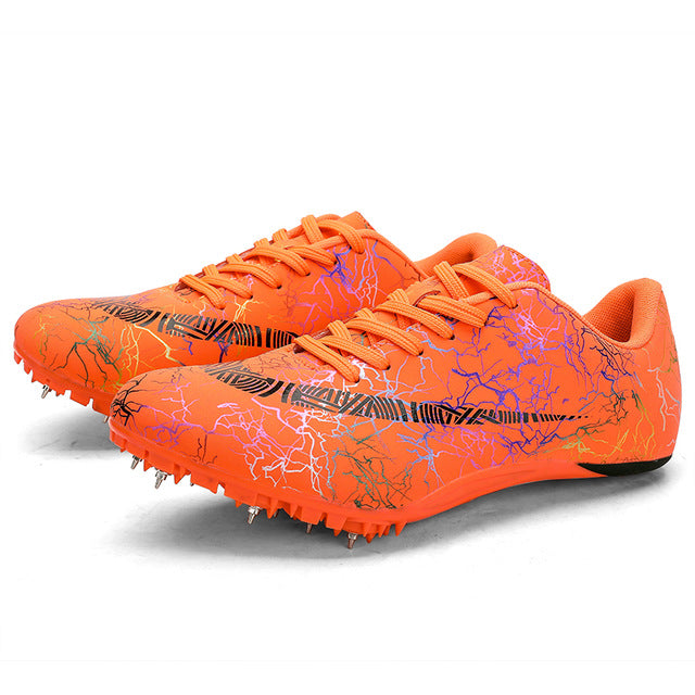 orange nike spikes