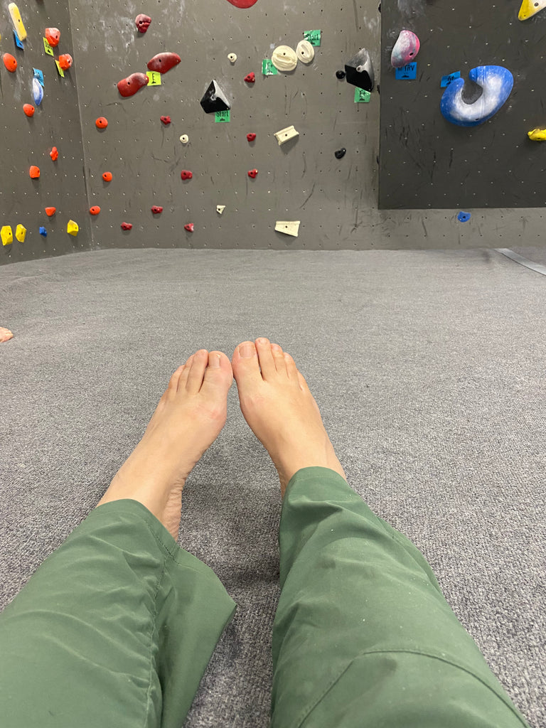 A climber at a gym in the Ponderosa Pants
