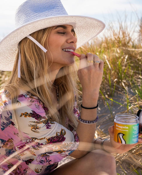 Woman eating CBD Gummies