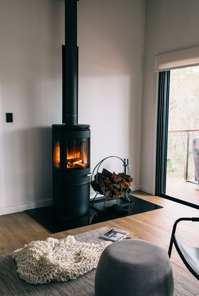 cosy fireplace in a light minimalist room