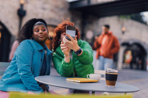 2 girls taking a selfie