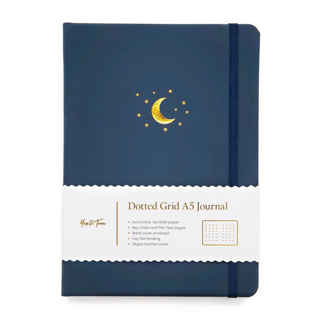 Midnight blue moon and stars dot grid journal