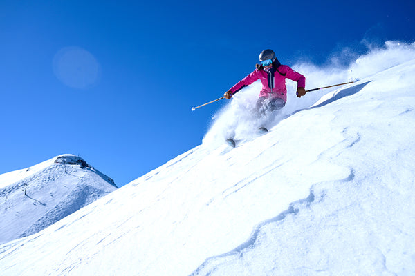A skier on Gold Hill on a bluebird day.