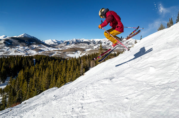 A skier pops some air off the ground