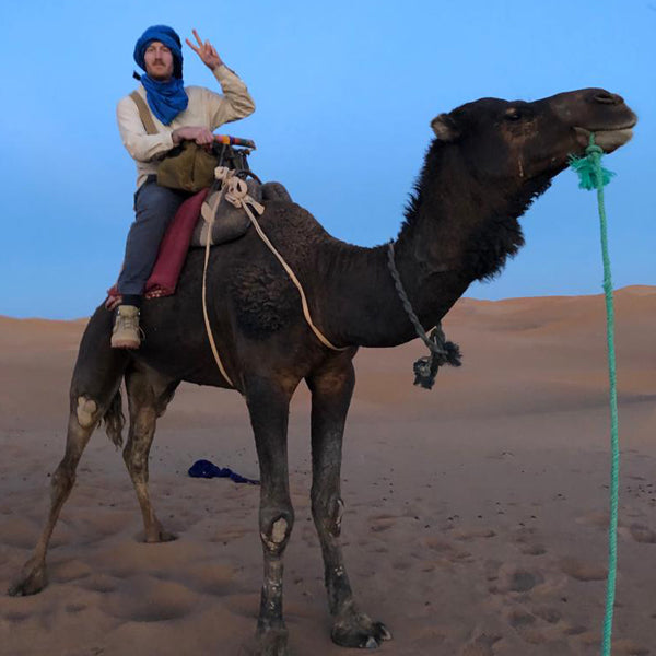 Mikael Kennedy atop a camel