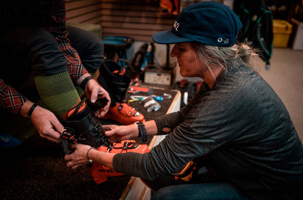 Sam Tischendorf of Telluride's BootDoctors fits a ski boot.