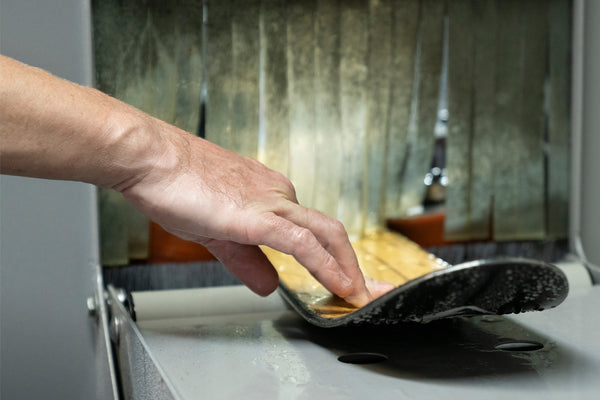 A ski gets tuned at the Wagner Custom Skis factory.