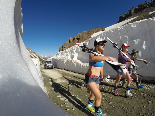 Women go summer skiing.