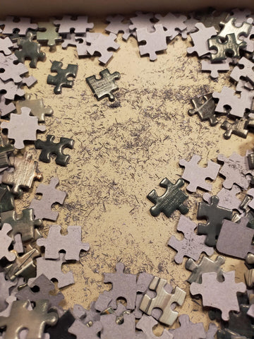 Dust in Jigsaw Puzzle Box