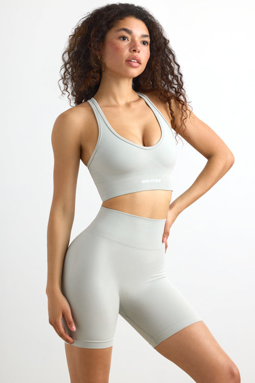 In Check Plunge Neck Define Luxe Sports Bra in Light Grey