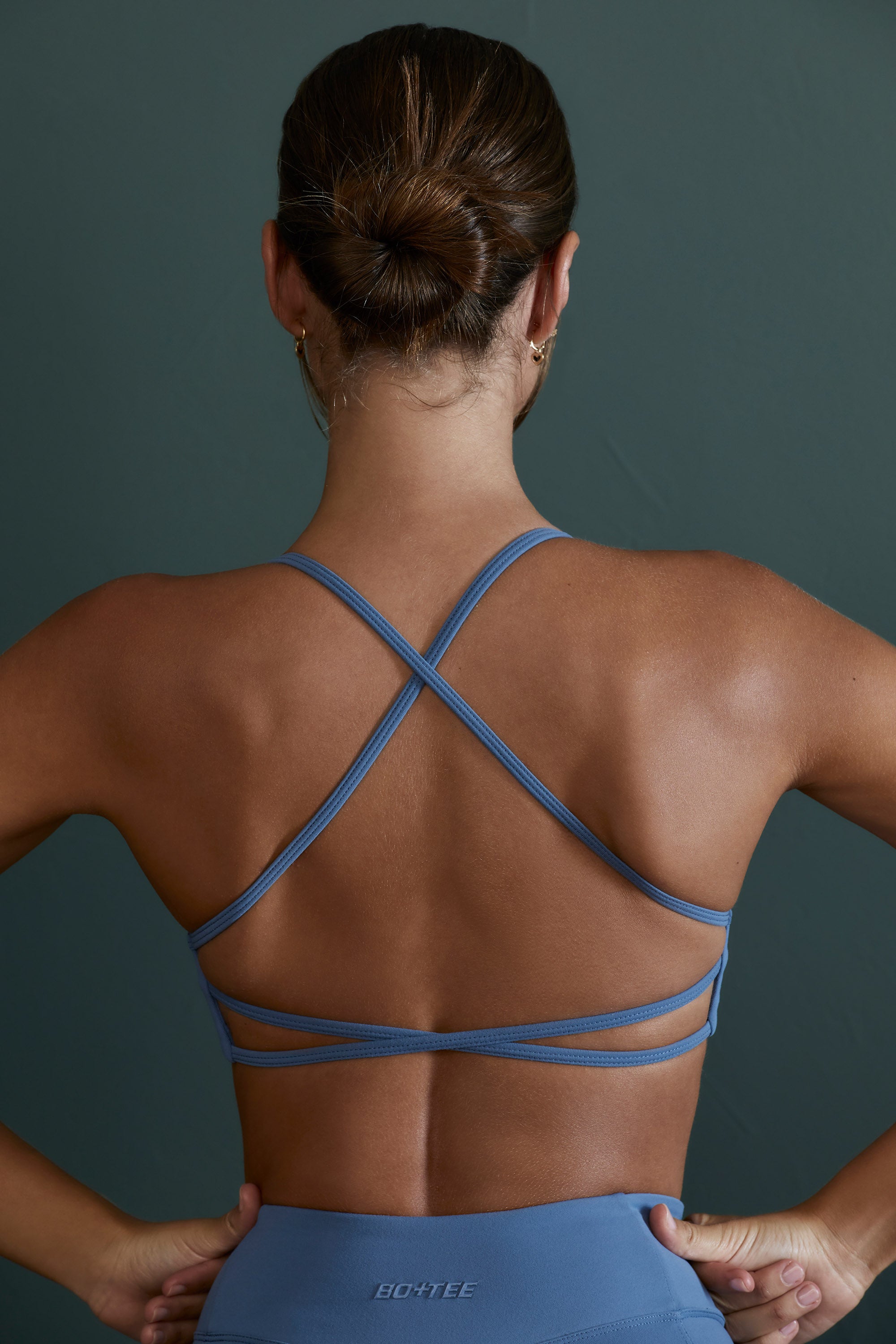 Enhance - Asymmetric Neckline Sports Bra in Blue