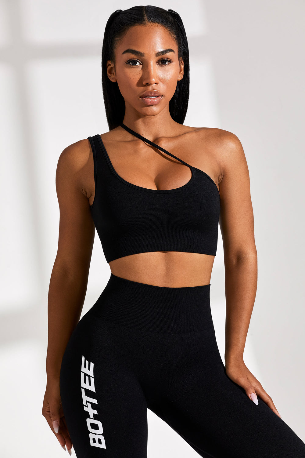 Withered Evaluering akse Evolve Asymmetric Seamless Crop Top in Black | Bo+Tee