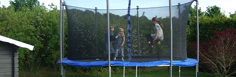 kids on a large trampoline
