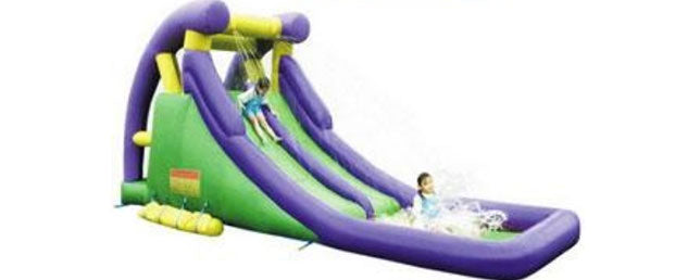kids playing on the residential splash water slides