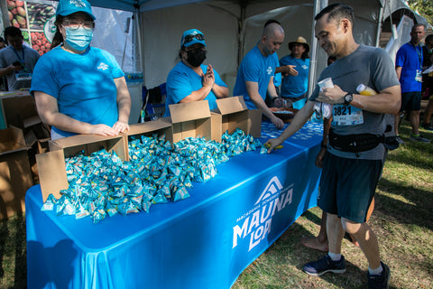Mauna Loa team working their tent at the Hapalua Finishers Festival
