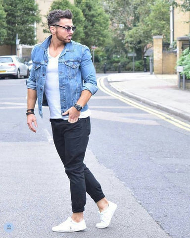 man in denim jacket with joggers