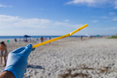 Plastic straw on a beach