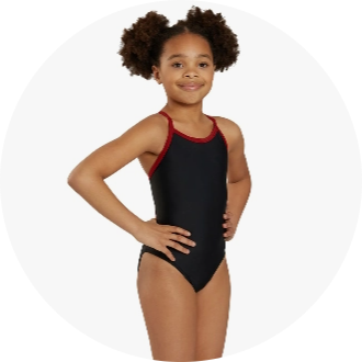 Young girl wearing a black one-piece swimsuit with red trim, posing confidently. Ideal for competitive swimming, this swimsuit offers comfort and durability.