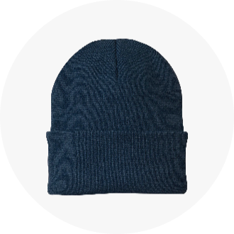 Navy blue knit beanie hat with a ribbed texture, perfect for keeping warm during outdoor activities. Ideal for swimming enthusiasts and available in the U.S. Masters Swimming online shop.