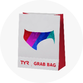 White and red grab bag with a colorful swimsuit design and the text "TYR Grab Bag" on the front. Ideal for swimmers looking for a surprise selection of swimwear.