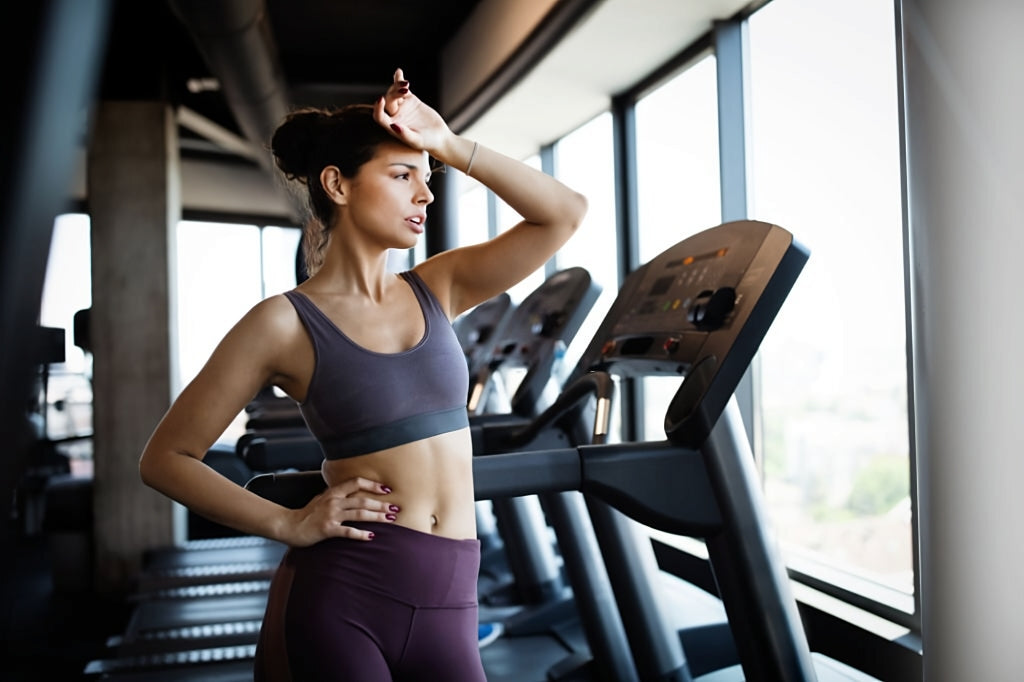 fitness woman reluctant to do cardio before or after bodybuilding