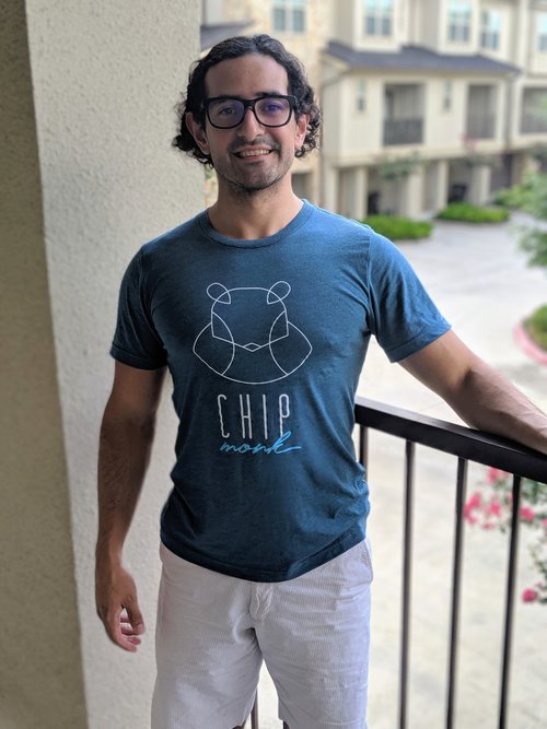 Jose, the Cofounder of ChipMonk Baking wearing steel-blue ChipMonk shirt