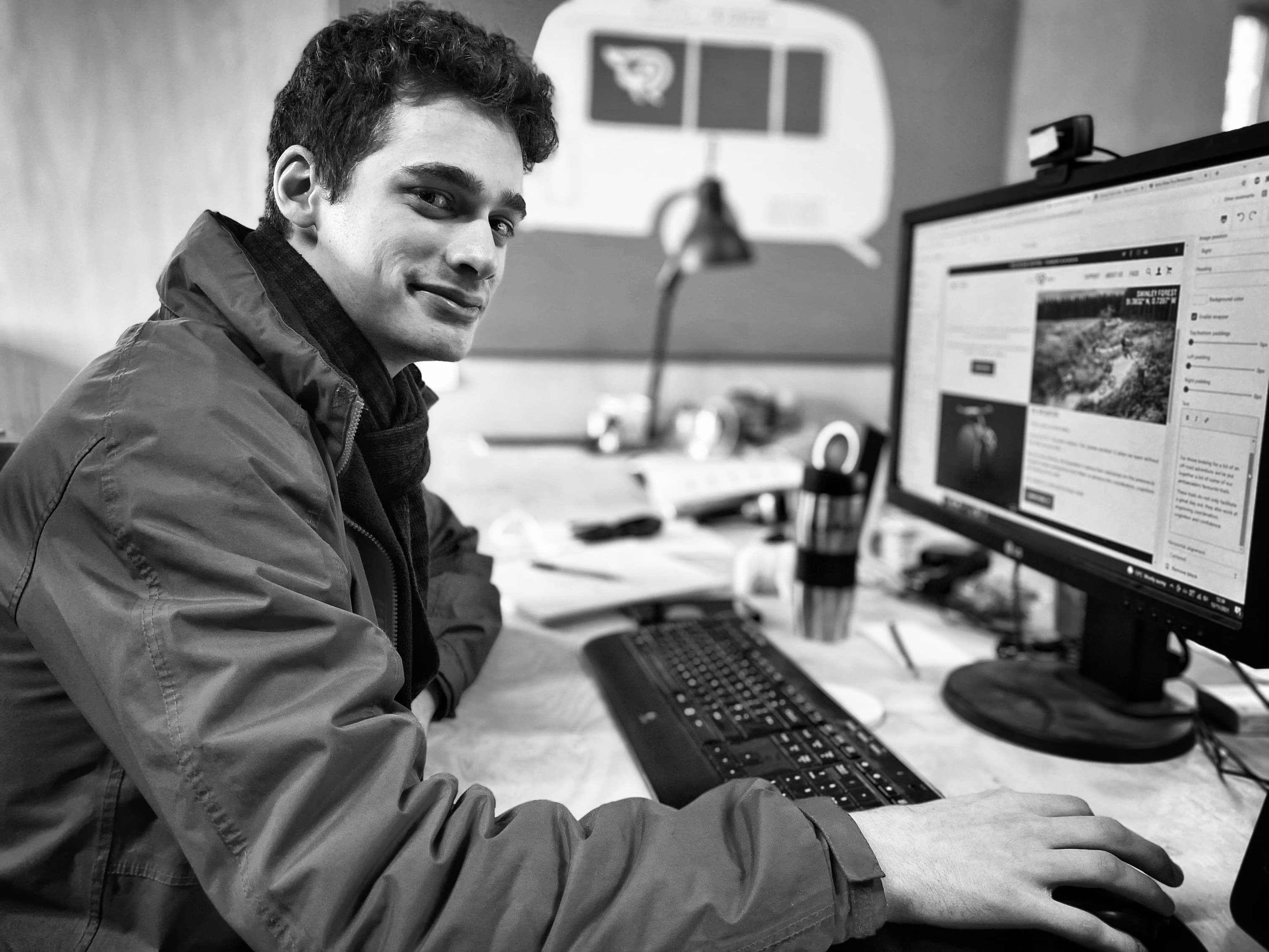 man sitting at a computer