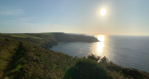 Autumn sunrise over Lantic Bay Polruan Cornwall